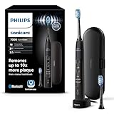 Philips Sonicare ExpertClean 7300 elektrische Zahnbürste, Schallzahnbürste mit App, 3 Putzmodi und 3 Intensitätsstufen, Drucksensor, Reiseetui, Schwarz, Model HX9601/02